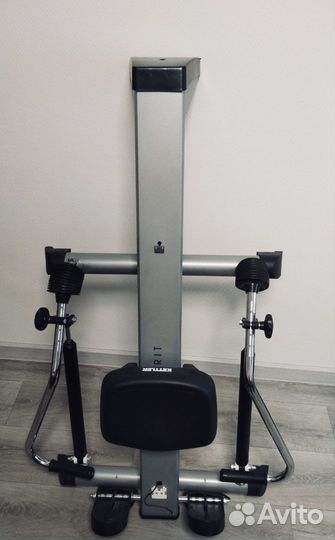 Гребной тренажер