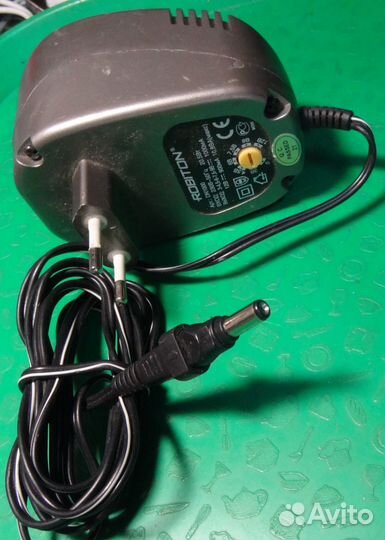 Блок питания Универс Robiton 3-12В 0.9А бу DN1000