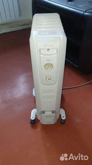 Масляный обогреватель delonghi