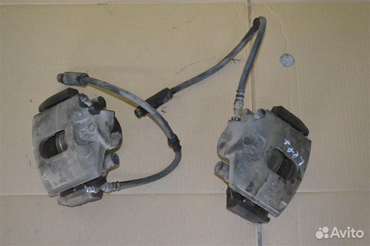 Суппорт передний правый Mazda Demio (dy5w) 2002-2