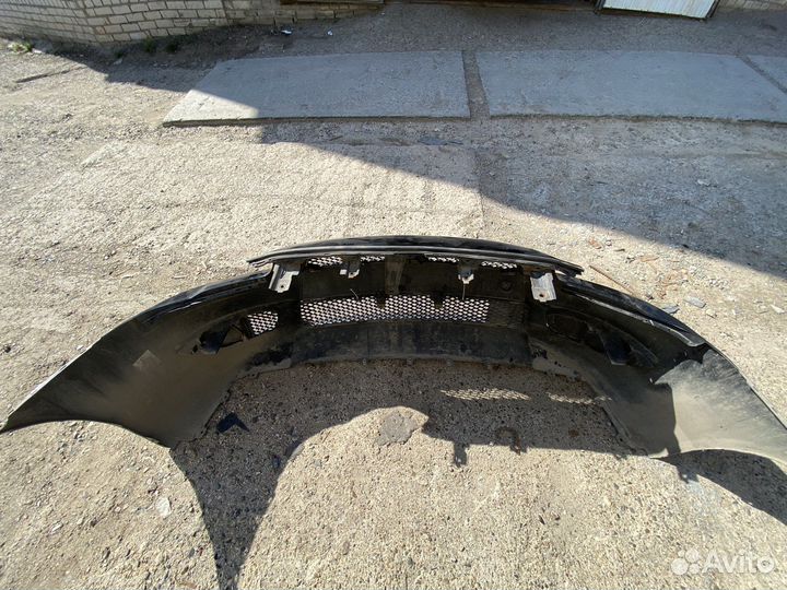 Передний бампер Mitsubishi Lancer 10