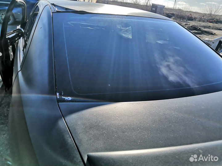 Стекло заднее Cadillac sts