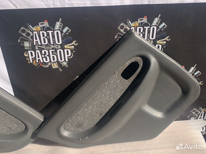 Kia spectra дверные карты задние