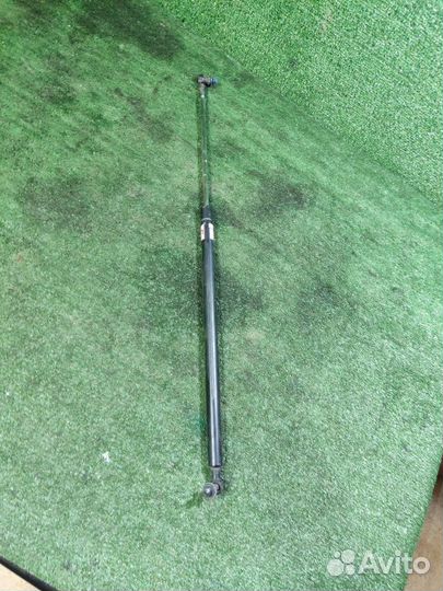 Амортизатор капота левый Toyota Land Cruiser 200