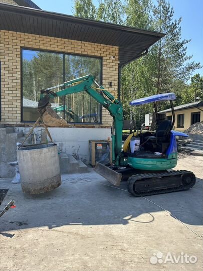 Услуги миниэкскаватора,Миниэкскаватор