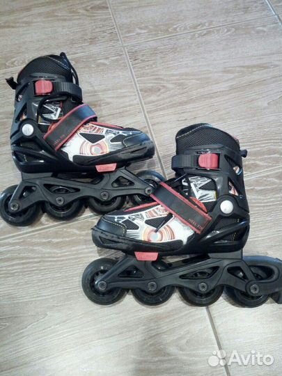 Роликовые коньки