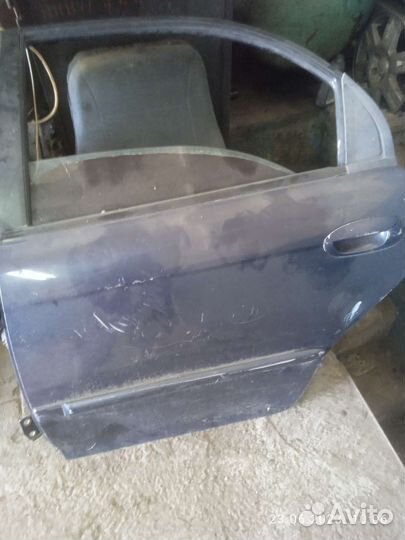 Двери Киа спектра,задняя и передняя правые,в сборе