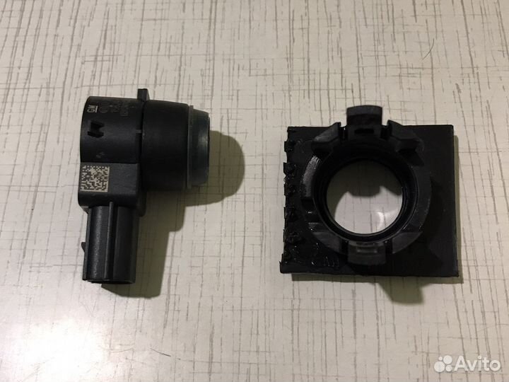 Датчик парковки Chevrolet Tahoe III 19116085 GM