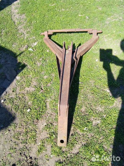 Плуг трехкорпусной