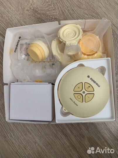 Молокоотсос электрический medela swing maxi