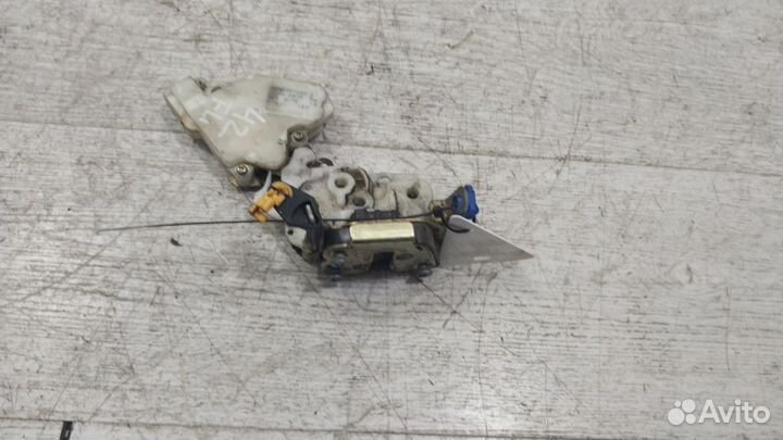 Замок двери передней левой Nissan Almera N16