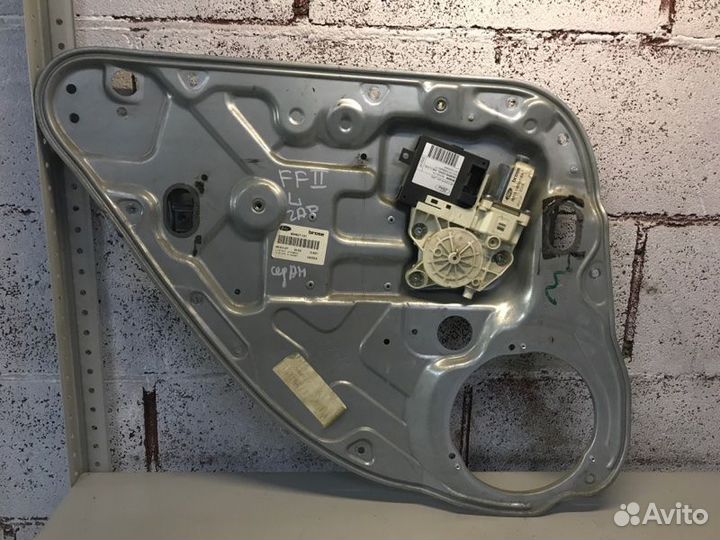 Стеклоподъемник электрический задний левый Ford
