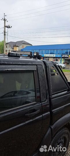 Дуга на патриот в кузов пикапа