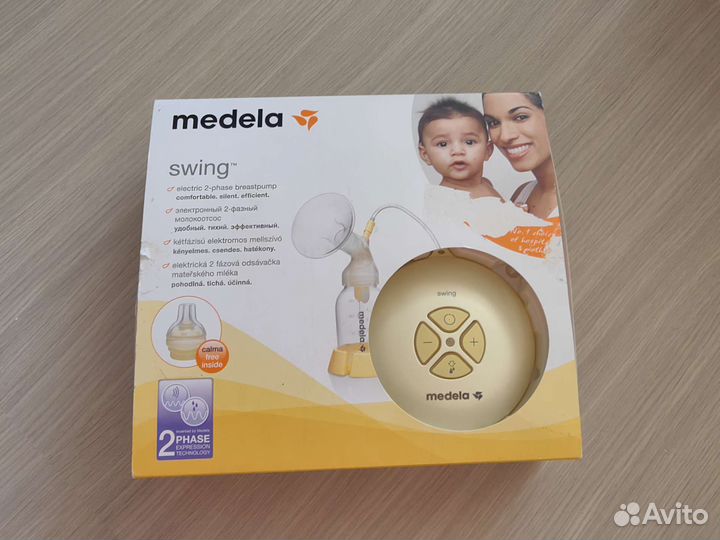 Молокоотсос medela swing электрический