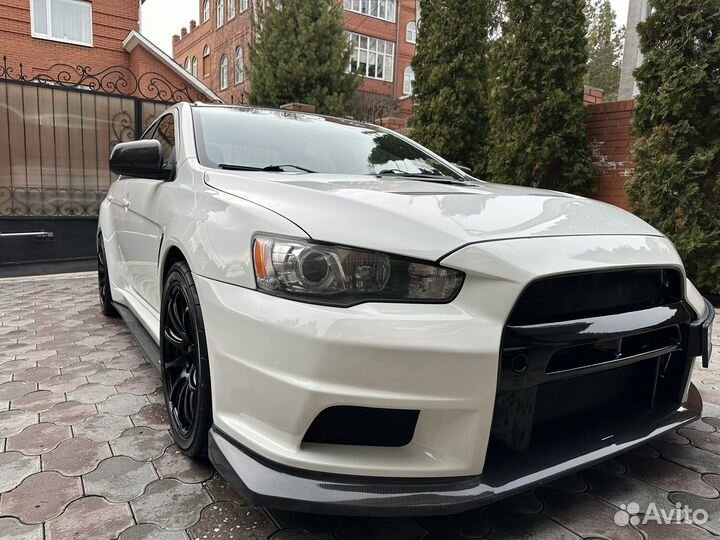 Mitsubishi Lancer Evolution 2.0 МТ, 2011, 75 000 км
