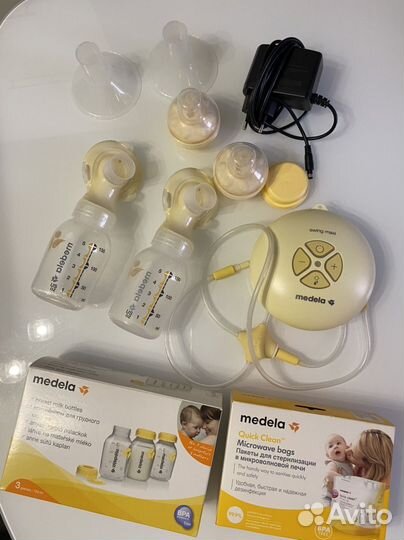 Молокоотсос двойной medela swing maxi