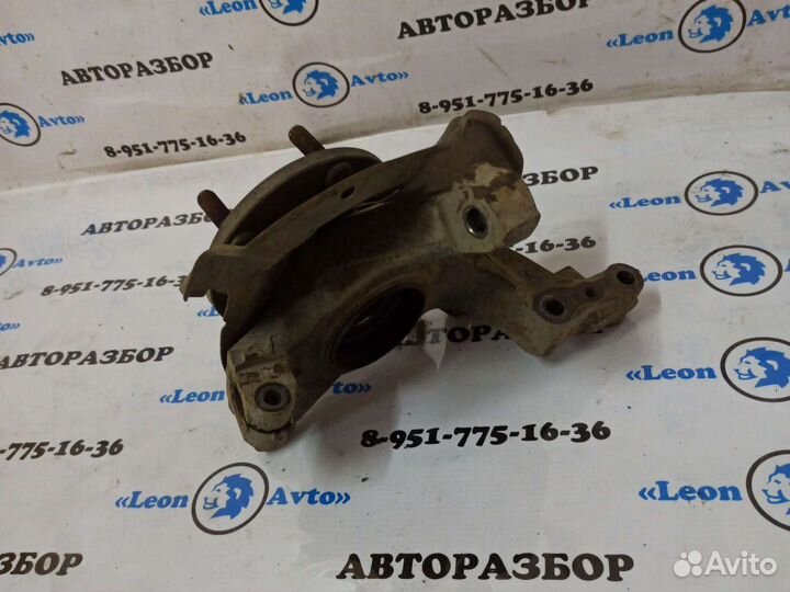 Кулак поворотный левый Mazda Capella GF