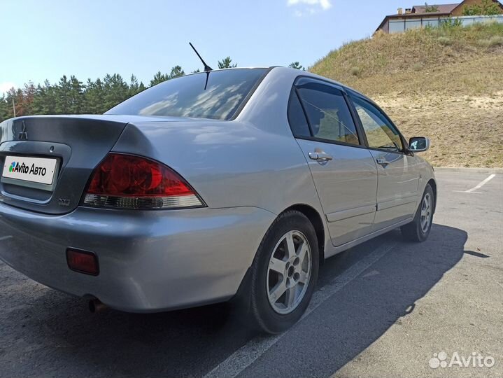 Mitsubishi Lancer 1.6 МТ, 2006, 413 523 км