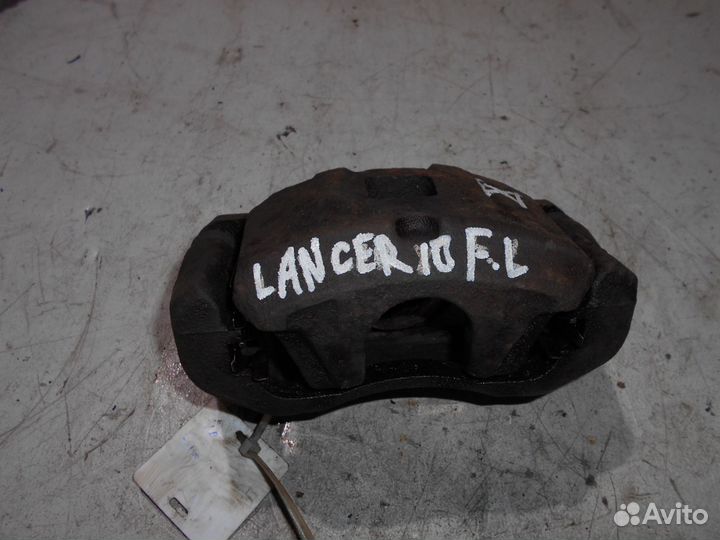 Суппорт передний левый Mitsubishi Lancer 10