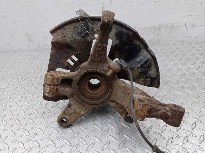 Кулак поворотный левый Mazda CX-9 1 TB