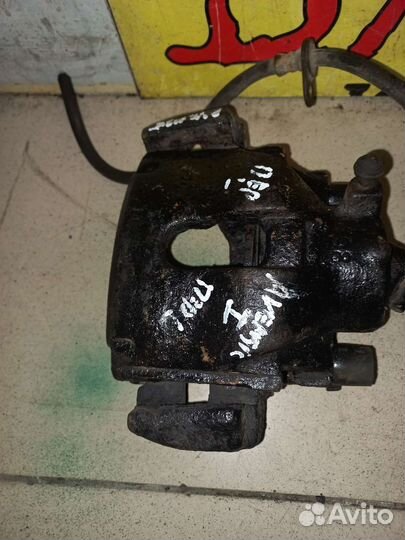 Суппорт тормозной передний Toyota Avensis I 97-02