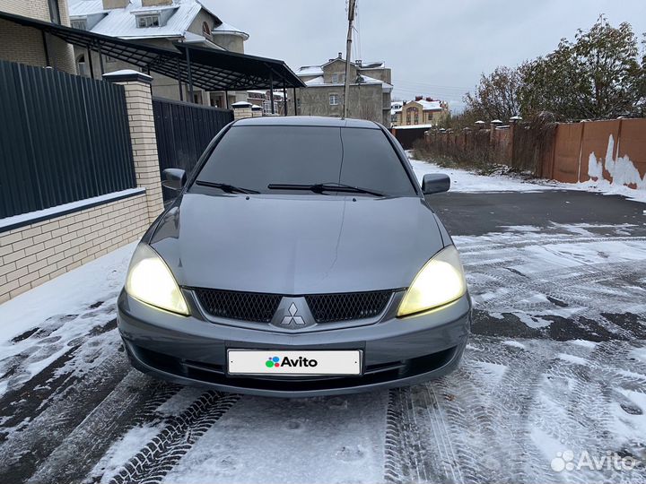 Mitsubishi Lancer 1.6 МТ, 2006, 212 146 км