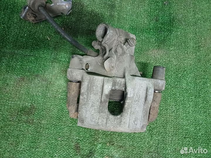 Суппорт задний левый Ford Focus 3