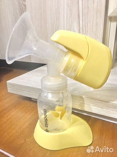 Молокоотсос medela электрический