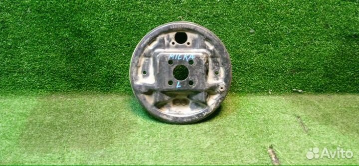 Щиток тормозного механизма задний левый Nissan