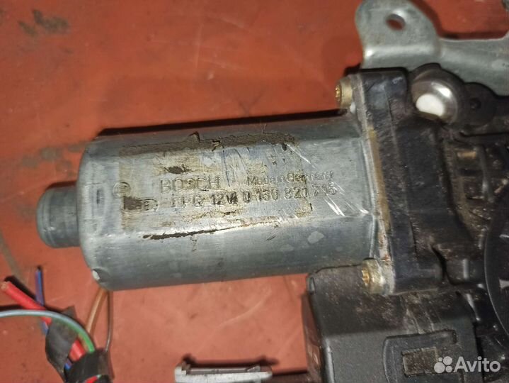 90521876 Стеклоподъемник передний Opel Astra G