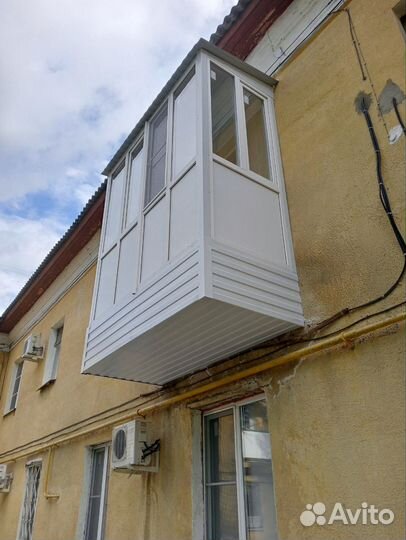 Пластиковые окна и балконы