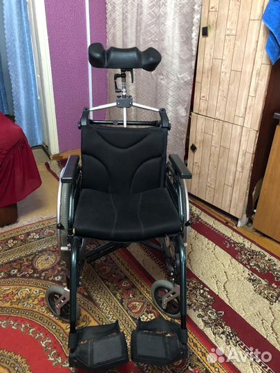 Инвалидная коляска