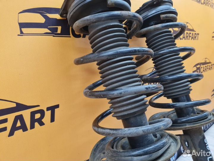 Амортизатор передний Nissan Qashqai J10 HR16DE