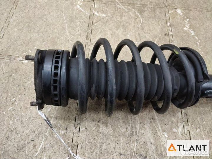 Стойка передняя левая mazda demio