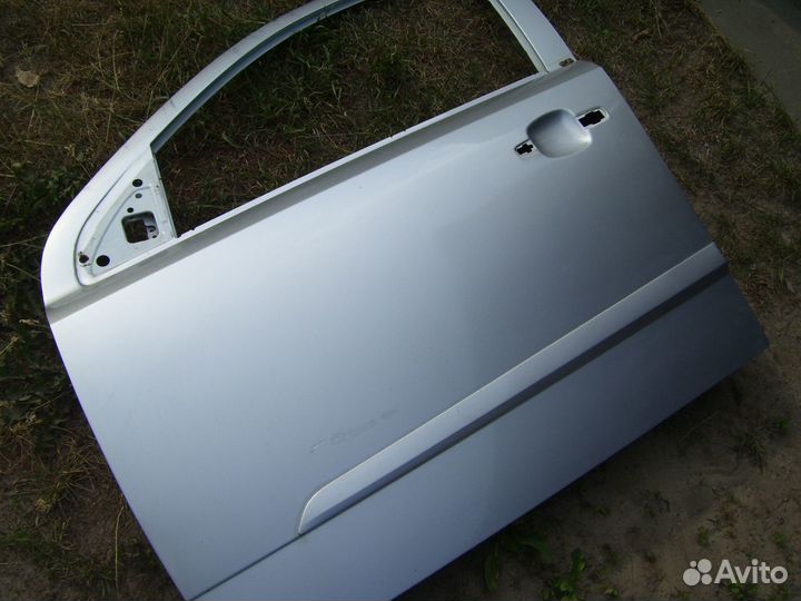 Опель астра H дверь