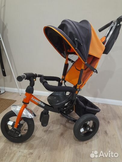 Трехколесный велосипед с ручкой детский