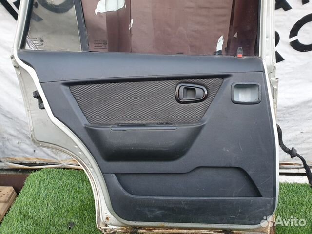 Обшивка двери задняя левая Daewoo Nexia