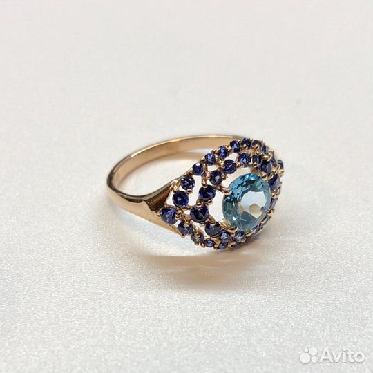 Золотое кольцо с топазом 585 пробы