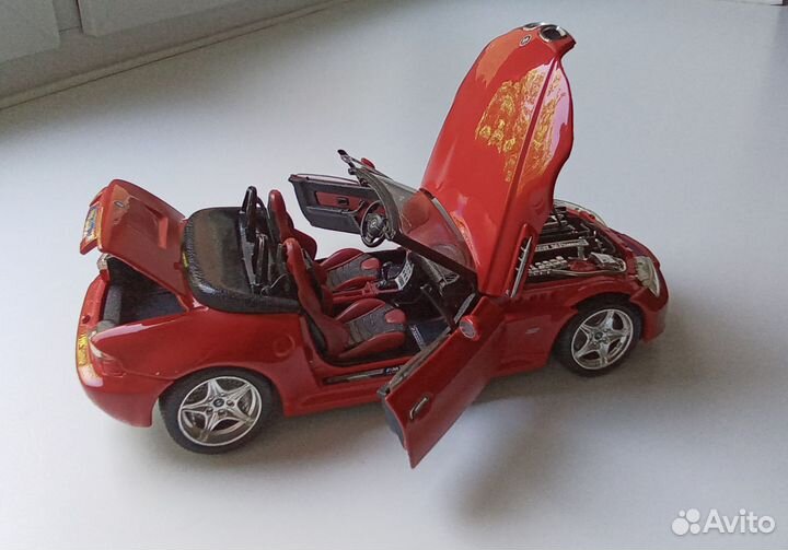 Модель машины BMW -M roadster(1996) 1/18 Bburago