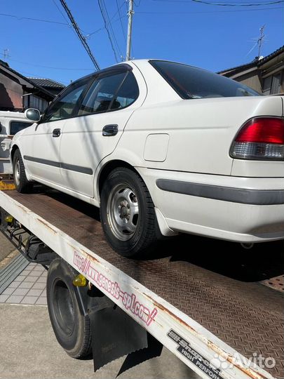 В разборе nissan sunny FB15 QG15-DE 2002