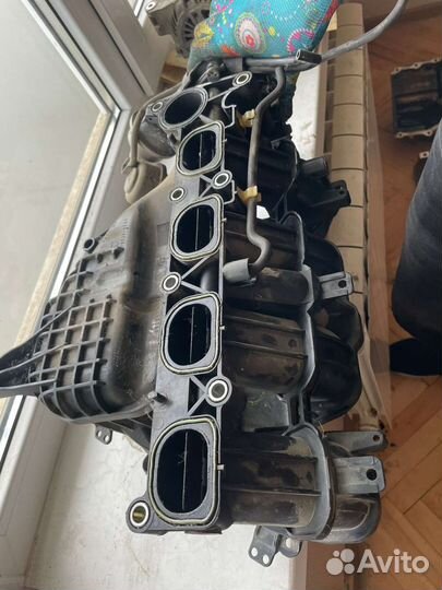 Коллектор mazda 3