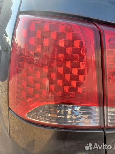 Фонарь левый наружний Kia Sorento 2 XM