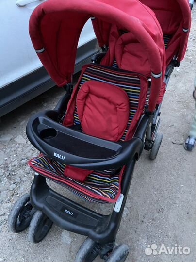 Коляска для двойни погодок