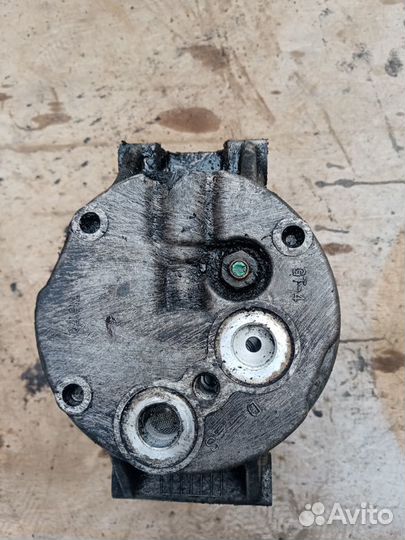 Компрессор кондиционера на Сан Енг Рекстон II 07г