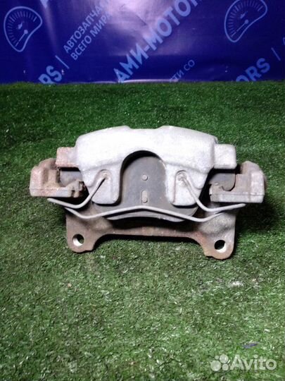 Суппорт тормозной передний левый Volkswagen Tiguan