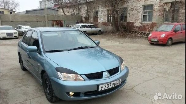 Заднее стекло на Mitsubishi Lancer 9 Установка