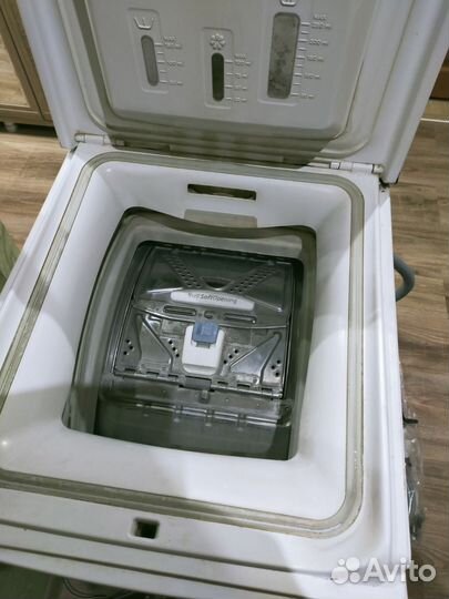 Стиральная машина с вертикальной загрузкой