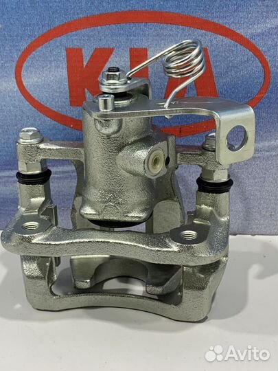 Суппорт тормозной задний Kia RIO 3 Лев