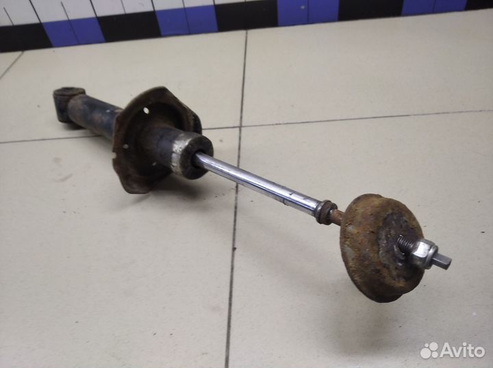 Амортизатор задний Almera N16 2000-2006