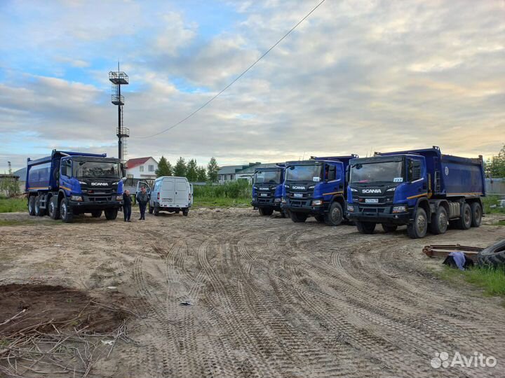 Водитель самосвала Scania